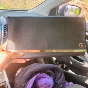 G by Guess Black Interior Pouch with Gold Logo Plate